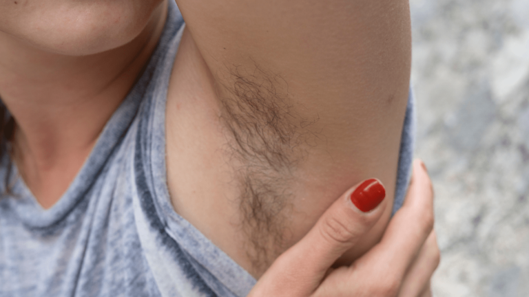 Woman with hairy armpits