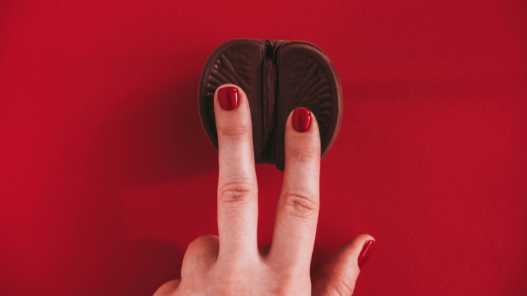 Woman touching chocolate to highlight female g-spot