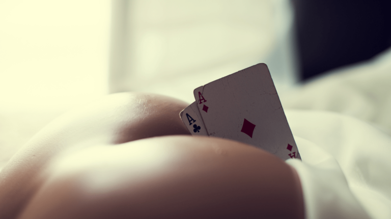 playing card in a woman's bum