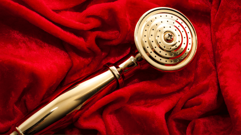 Golden showerhead wrapped in red velvet