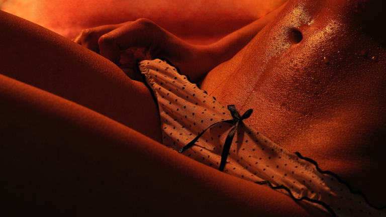 close up of a woman's sweaty stomach