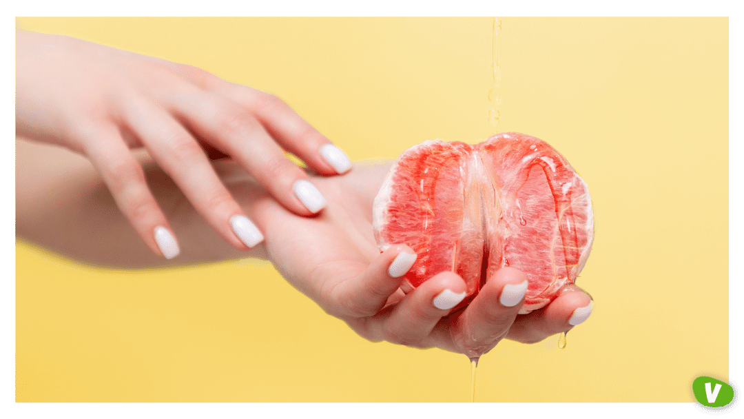 image of hands holding a grapefruit, concept of masturbation