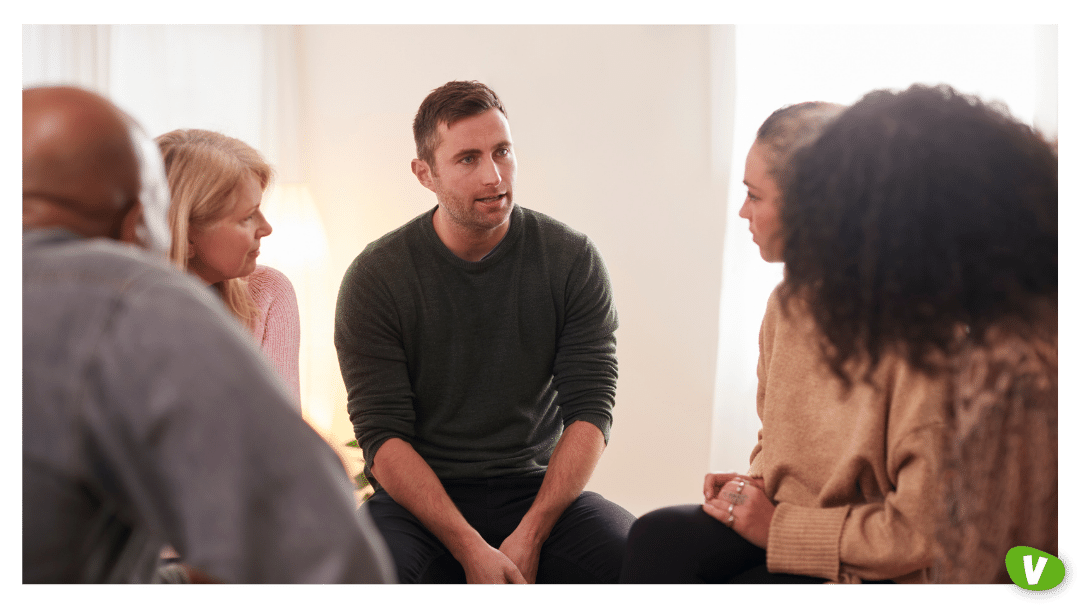 mental health support group man talking to the group