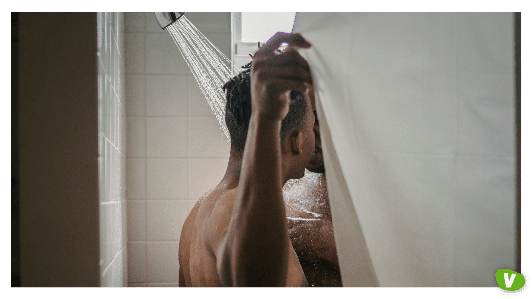 two lgbtq men kissing in the shower