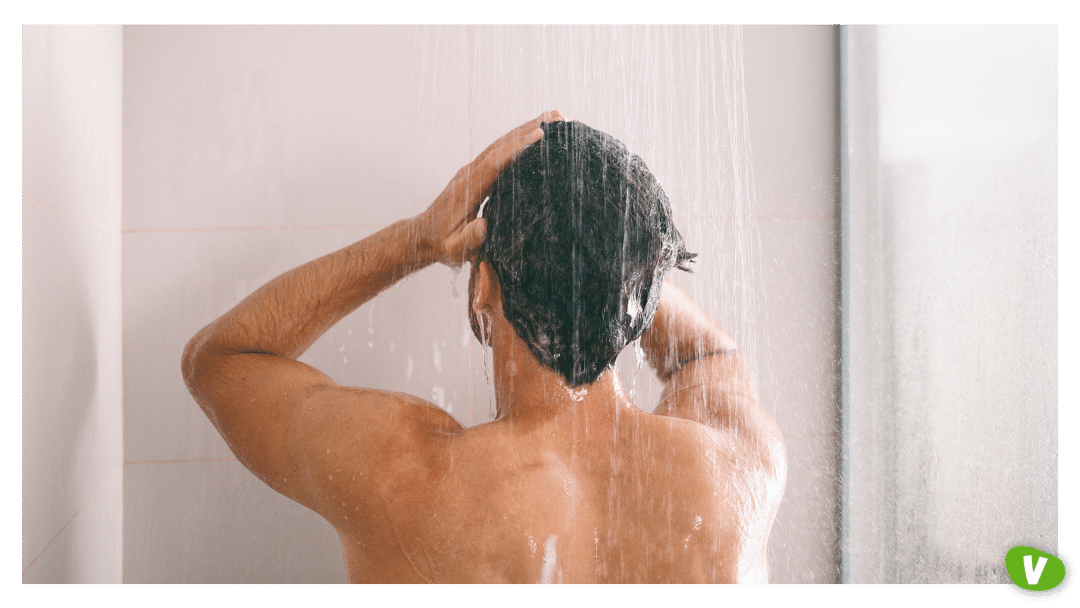 man taking a shower preparing to meet an escort