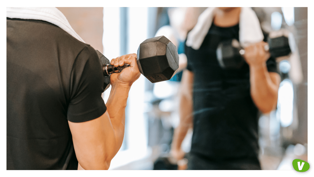 close up of a man working out in the gym