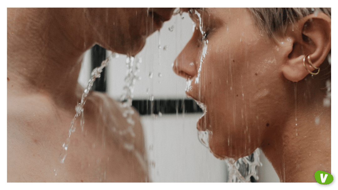 close up of a couple being intimate in the shower