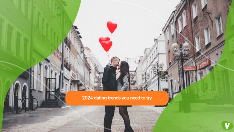 couple kissing on an empty street, the man holding heart-shaped balloons