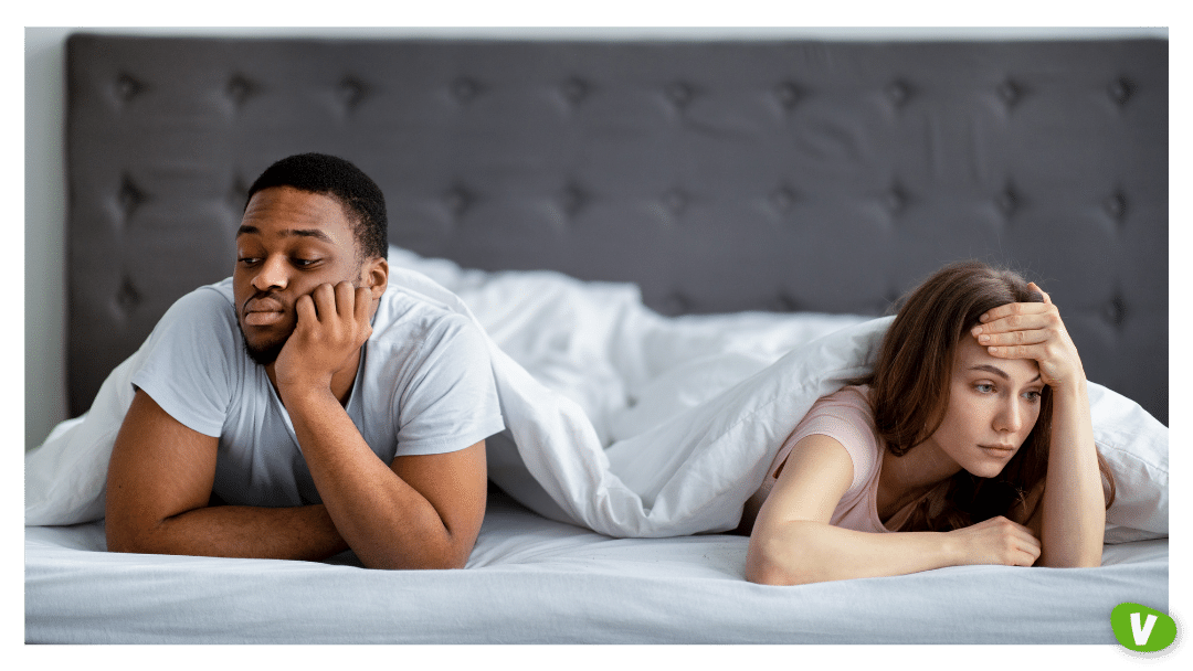 young multiracial couple experiencing relationship problems, dead bedroom concept