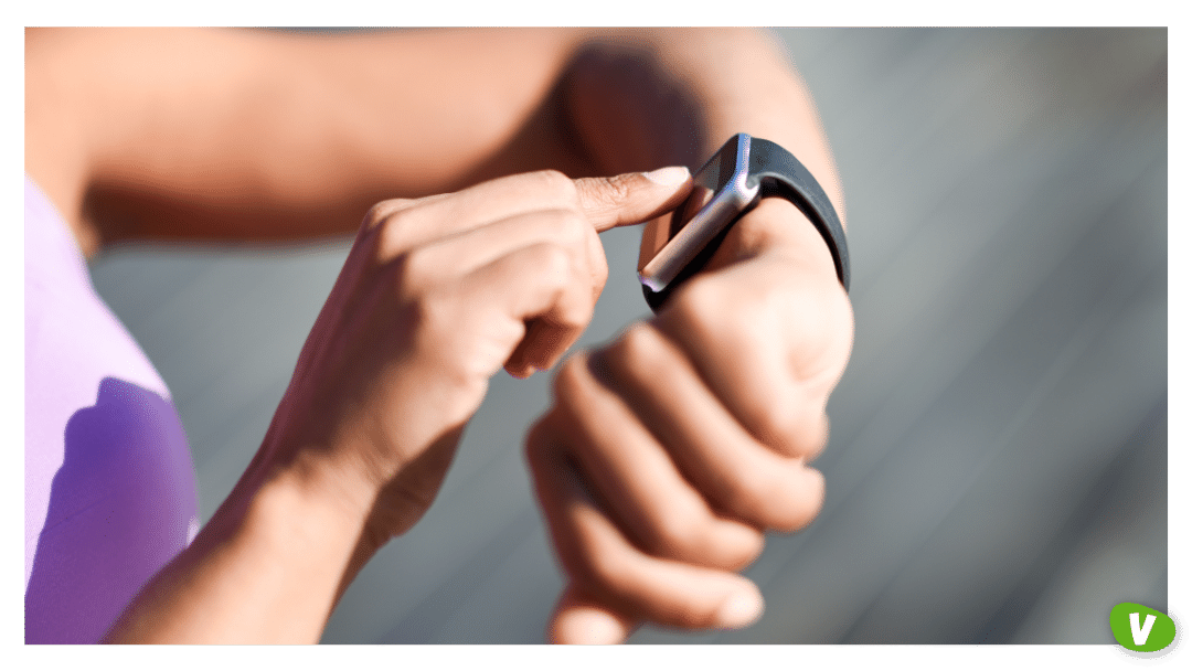 close up of a woman using a smartwatch