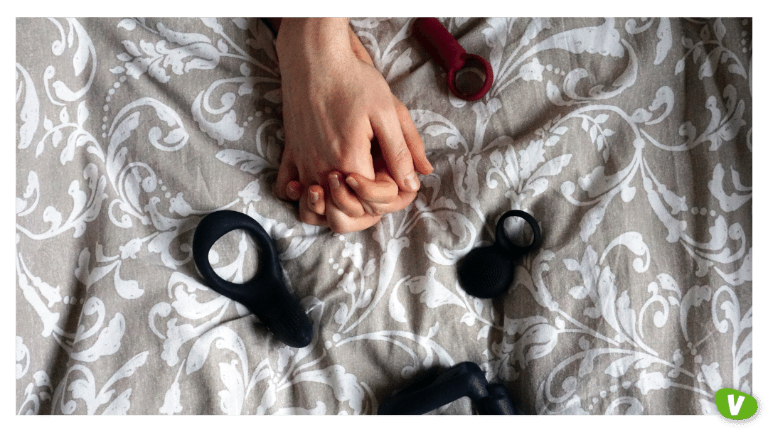 close up of adult toys on bedding