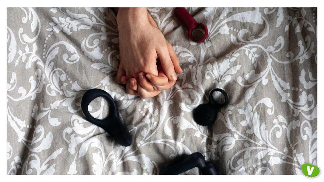 close up of adult toys on bedding