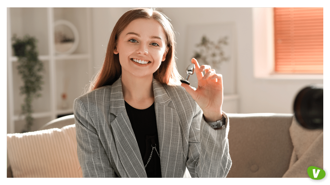 Female Blogger with Anal Plug Conducting Sex Education Online at Home⁠