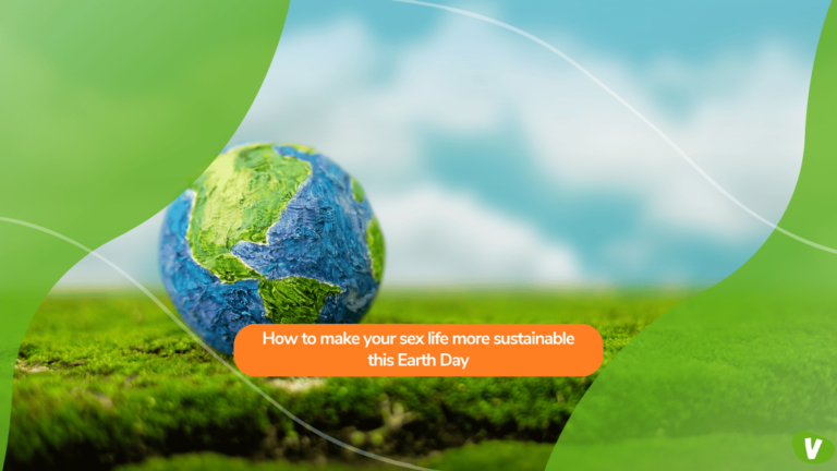 A model of planet Earth sitting on fresh green grass under a bright sky, with text overlay: ‘How to make your sex life more sustainable this Earth Day’.