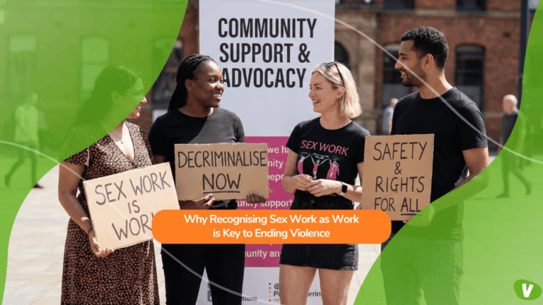 Four people stand outdoors holding signs that read “Sex work is work,” “Decriminalise now,” and “Safety & rights for all.” They smile and talk in front of a banner that says “Community Support & Advocacy.” Overlaid text reads: “Why Recognising Sex Work as Work is Key to Ending Violence.”