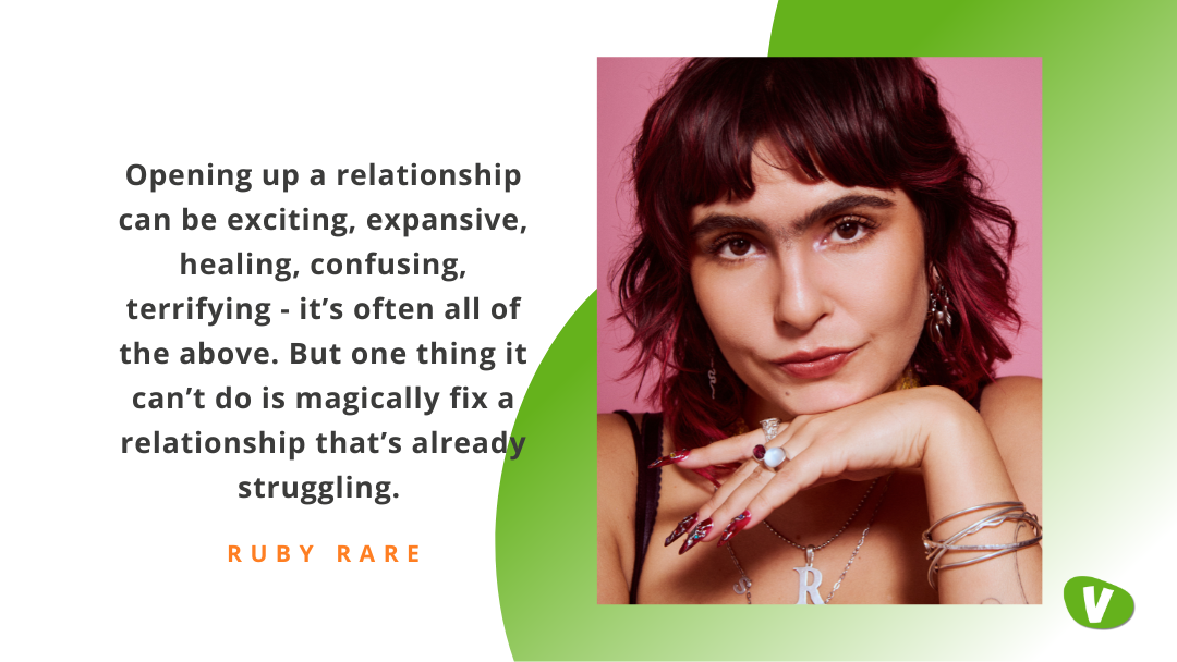 A portrait of Ruby Rare against a pink background, resting her chin on her hand and looking toward the camera. To the left of the image is a quote in bold text about opening a relationship, ending with her name, Ruby Rare. Green graphic shapes frame the right side.